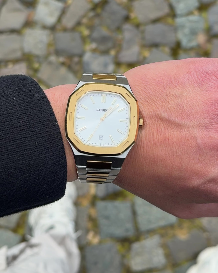D-FFRENT Aura Two Tone watch on wrist with smooth rotation movement, silver and gold finish